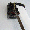 Ode to One the Road, Typewriter, steel pole, tire shred and paper, 2009